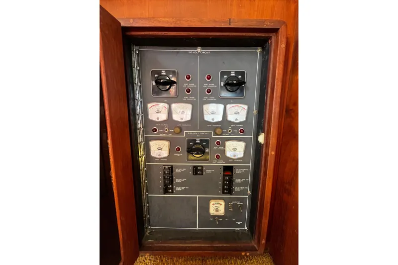  Yacht Photos Pics Electrical panel of a 1978 Hatteras 53 Yacht Fisherman, featuring gauges and switches.
