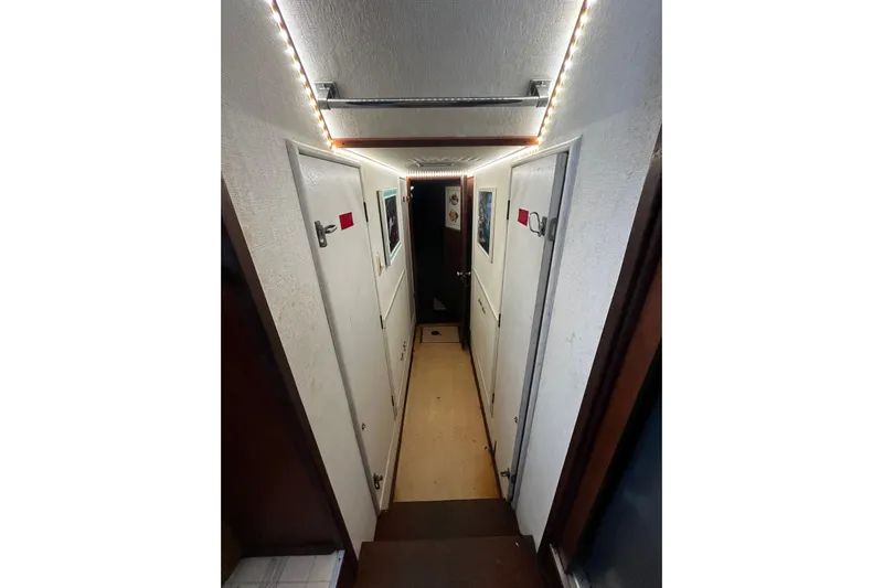  Yacht Photos Pics Interior hallway of a 1978 Hatteras 53 Yacht Fisherman with LED lighting.