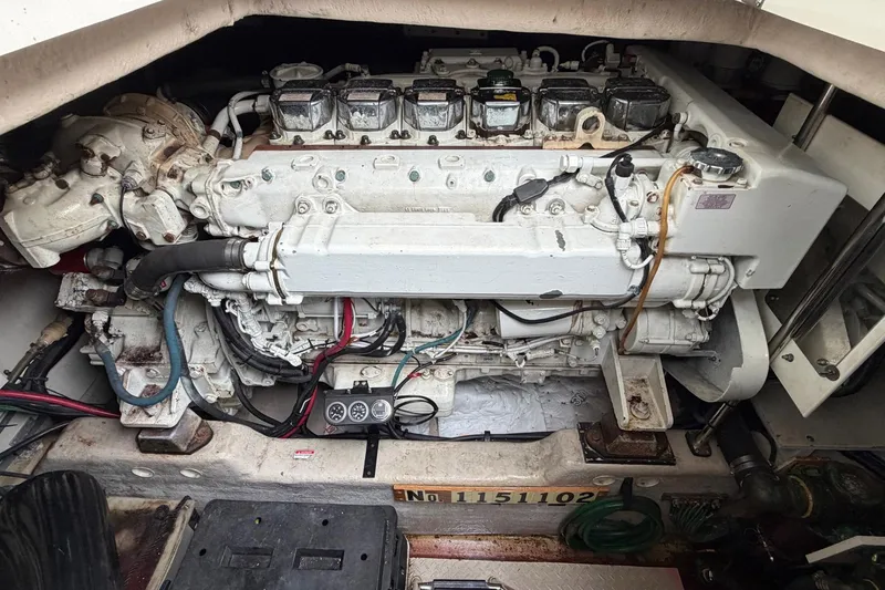 Galaxsea 500 Yacht Photos Pics Engine compartment of a 2004 Sea Ray 500 Sundancer boat, showcasing detailed machinery.