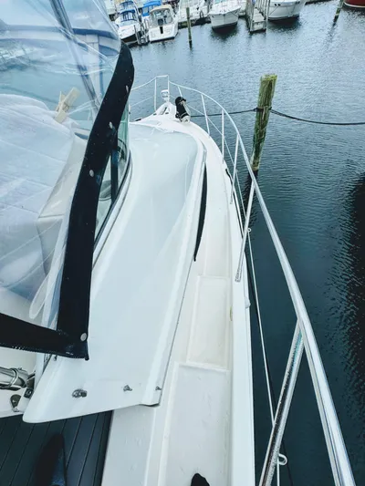  Yacht Photos Pics 2005 Silverton 35 Motor Yacht docked at marina, view from deck.