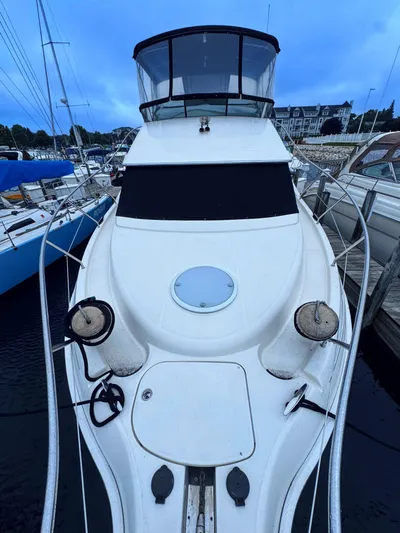  Yacht Photos Pics 2005 Silverton 35 Motor Yacht docked at marina, front view.