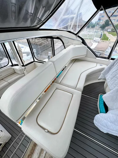  Yacht Photos Pics 2005 Silverton 35 Motor Yacht interior with white seating and modern design.