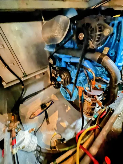  Yacht Photos Pics Engine compartment of a 2005 Silverton 35 Motor Yacht, showcasing mechanical components.