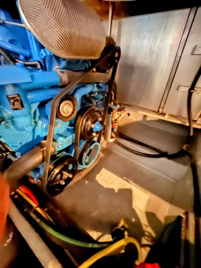  Yacht Photos Pics Engine compartment of a 2005 Silverton 35 Motor Yacht, showcasing mechanical components.