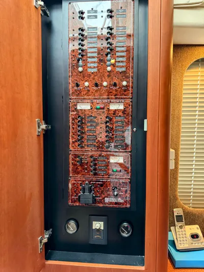  Yacht Photos Pics Electrical panel inside a 2005 Silverton 35 Motor Yacht, featuring switches and gauges.