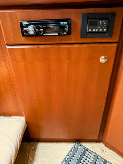  Yacht Photos Pics 2005 Silverton 35 Motor Yacht interior with audio system and control panel.