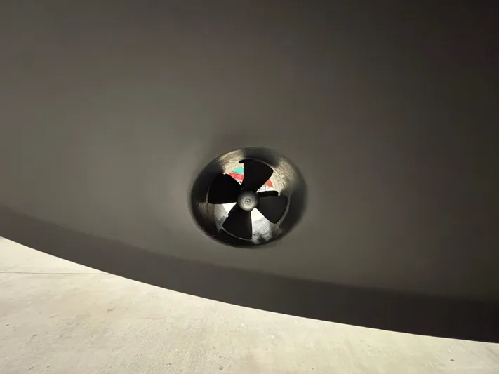 Lucy Yacht Photos Pics Close-up of a 2006 Ellis Express boat propeller under the hull.