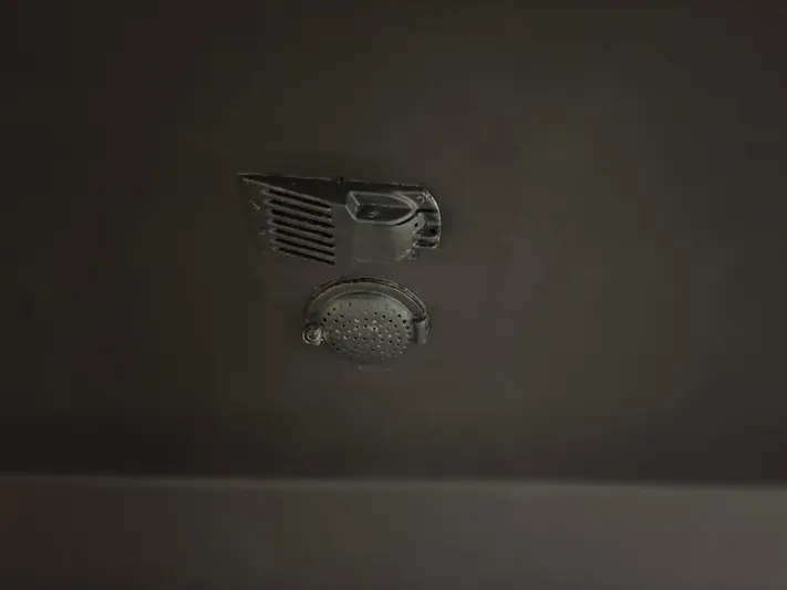 Lucy Yacht Photos Pics Ceiling-mounted ventilation and speaker system in a 2006 Ellis Express vehicle.