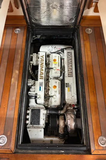 Lucy Yacht Photos Pics Yanmar engine in 2006 Ellis Express boat, wooden compartment view.