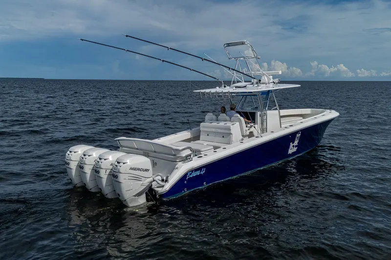 The Hogfather Yacht Photos Pics 2015 Bahama 41 boat with four Mercury engines on open water.