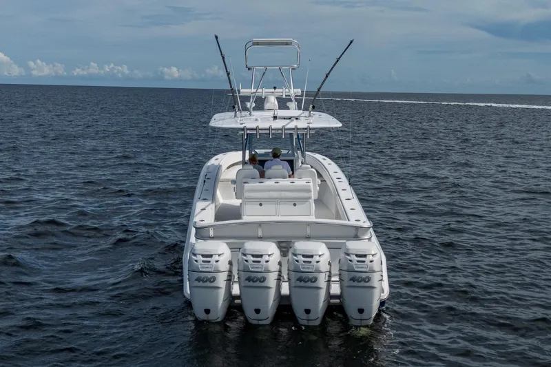 The Hogfather Yacht Photos Pics 2015 Bahama 41 boat with four engines cruising on open water.