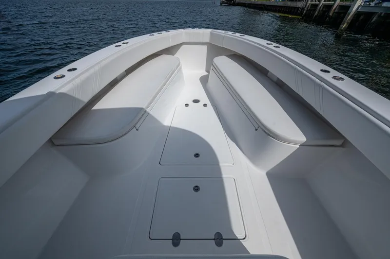 The Hogfather Yacht Photos Pics Bow view of 2015 Bahama 41 boat with spacious seating and storage.
