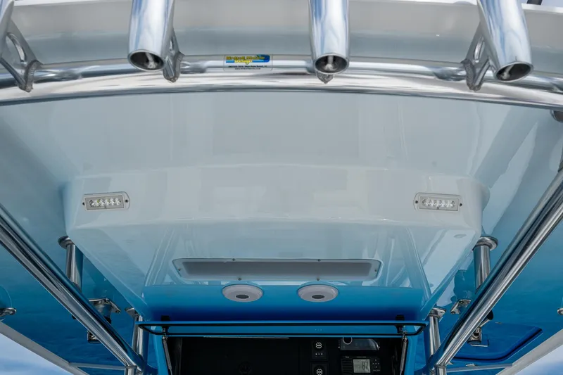 The Hogfather Yacht Photos Pics 2015 Bahama 41 boat's T-top with rod holders and integrated lighting.