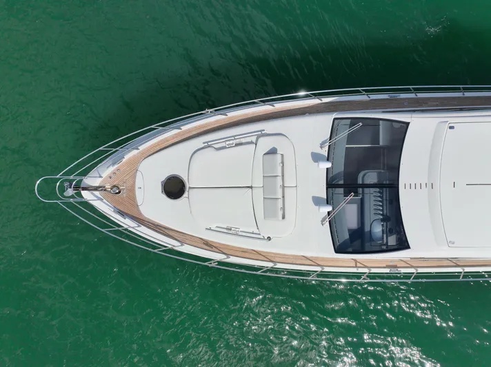 Warren Kelly Yacht Photos Pics Overhead view of 2010 Azimut 62S yacht on green water.