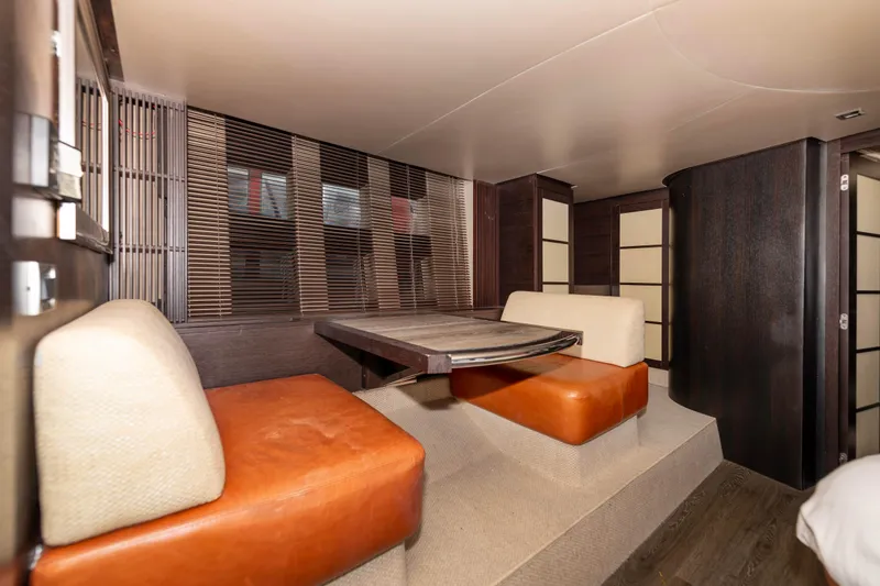 Warren Kelly Yacht Photos Pics Luxurious interior of 2010 Azimut 62S yacht with modern seating and table.