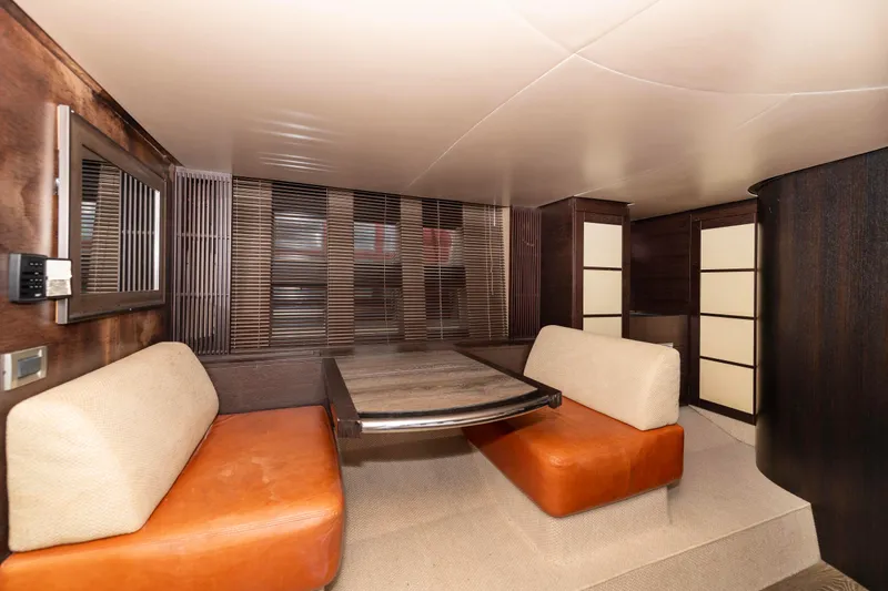 Warren Kelly Yacht Photos Pics Luxurious interior of a 2010 Azimut 62S yacht with modern seating and elegant design.