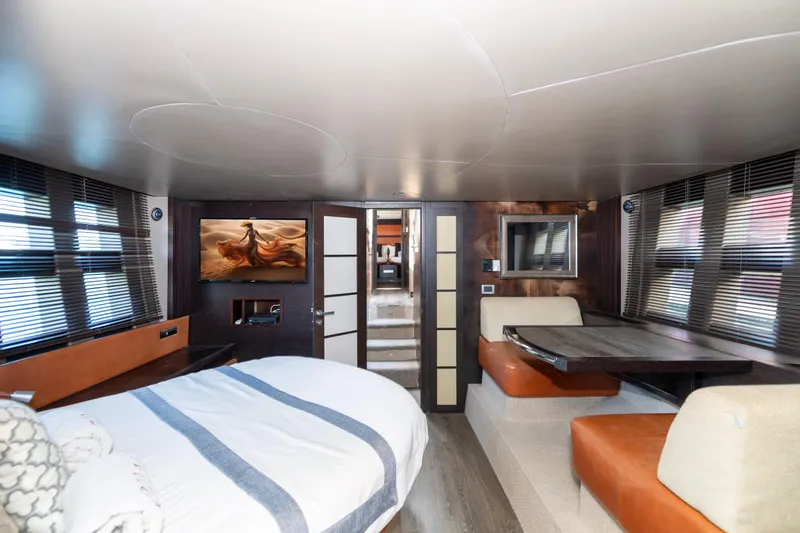 Warren Kelly Yacht Photos Pics Luxurious interior of a 2010 Azimut 62S yacht with modern furnishings and elegant decor.