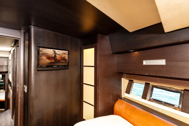 Warren Kelly Yacht Photos Pics Luxurious interior of 2010 Azimut 62S yacht with modern decor and window views.