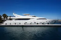 Luxurious 2005 Custom Line 112 yacht docked on a sunny day.