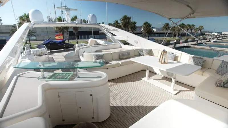 Camarik Yacht Photos Pics Luxurious 2005 Custom Line 112 yacht deck with elegant seating and modern amenities.