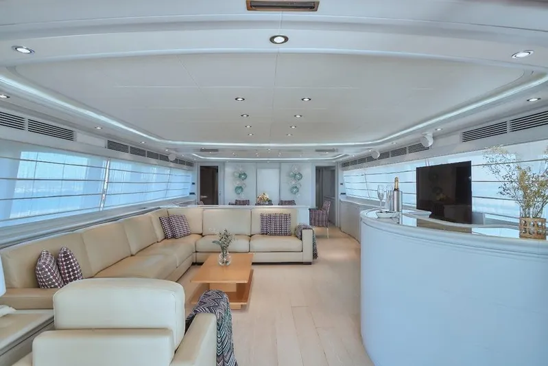 Camarik Yacht Photos Pics Luxurious interior of 2005 Custom Line 112 yacht with elegant seating and modern decor.