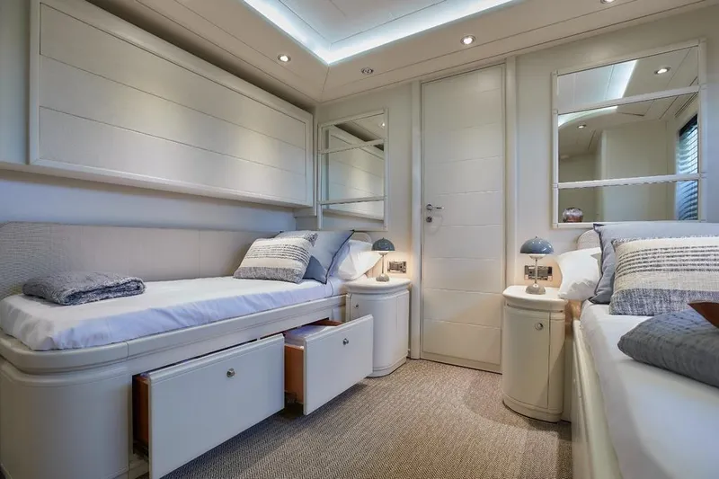 Camarik Yacht Photos Pics Luxurious yacht bedroom with twin beds, elegant decor, and soft lighting, Custom Line 112, 2005.