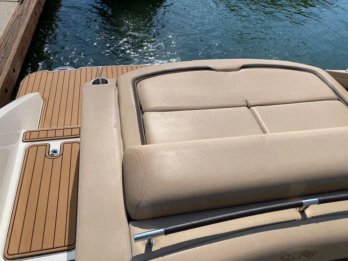 2017 Sea Ray 310 Slx @ Puerto Vallarta Yacht Photos Pics 2017 Sea Ray 310 SLX boat with tan seating and wooden deck by the water.