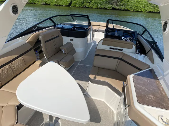 2017 Sea Ray 310 Slx @ Puerto Vallarta Yacht Photos Pics Luxurious 2017 Sea Ray 310 SLX boat interior with beige seating and sleek design.