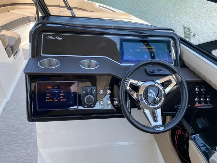 2017 Sea Ray 310 Slx @ Puerto Vallarta Yacht Photos Pics 2017 Sea Ray 310 SLX dashboard with modern controls and steering wheel.