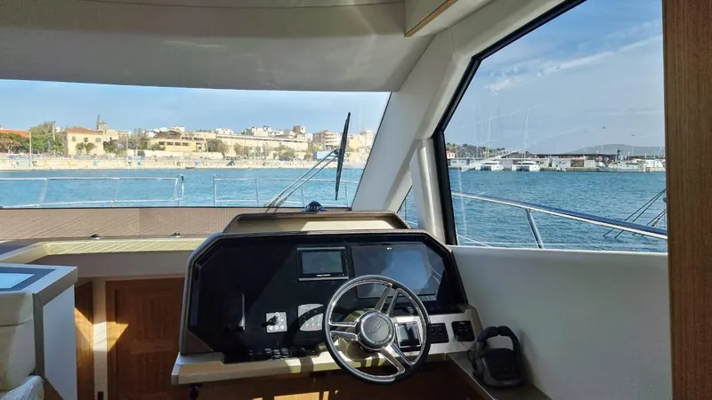  Yacht Photos Pics Helm of 2024 Galeon 500 Fly yacht with waterfront view.
