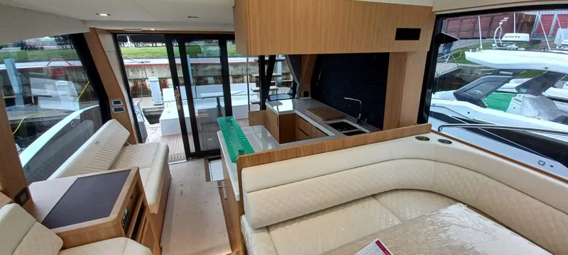  Yacht Photos Pics 2024 Galeon 500 Fly yacht interior with modern design and spacious seating area.