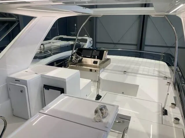  Yacht Photos Pics 2024 Galeon 500 Fly yacht interior with modern helm and seating area.
