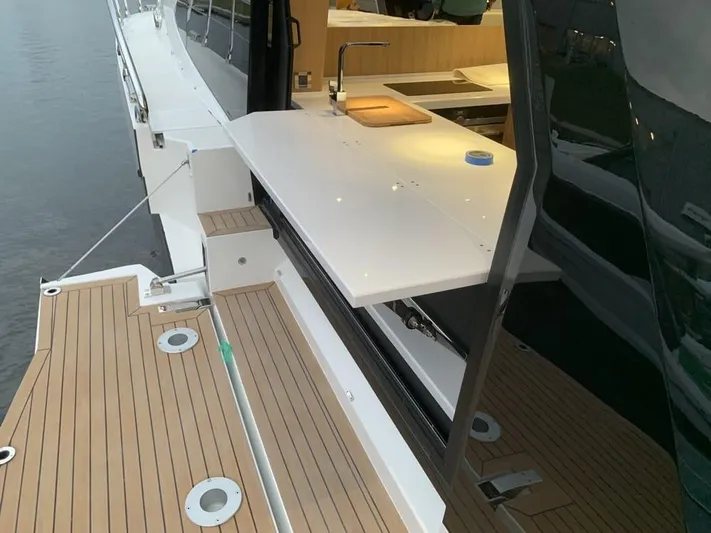  Yacht Photos Pics 2024 Galeon 500 Fly yacht with sleek deck and modern kitchen area.