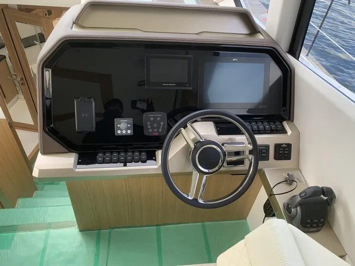  Yacht Photos Pics 2024 Galeon 500 Fly helm with modern controls and navigation screens.