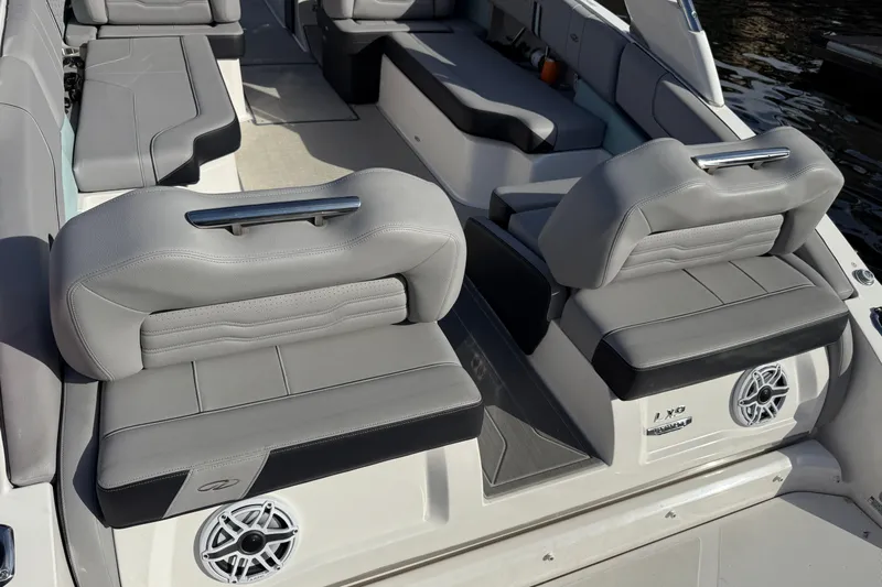  Yacht Photos Pics 2024 Regal LX9 boat interior with luxurious gray seating and modern design.