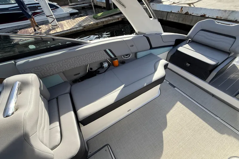  Yacht Photos Pics 2024 Regal LX9 boat interior with sleek gray seating and modern design.