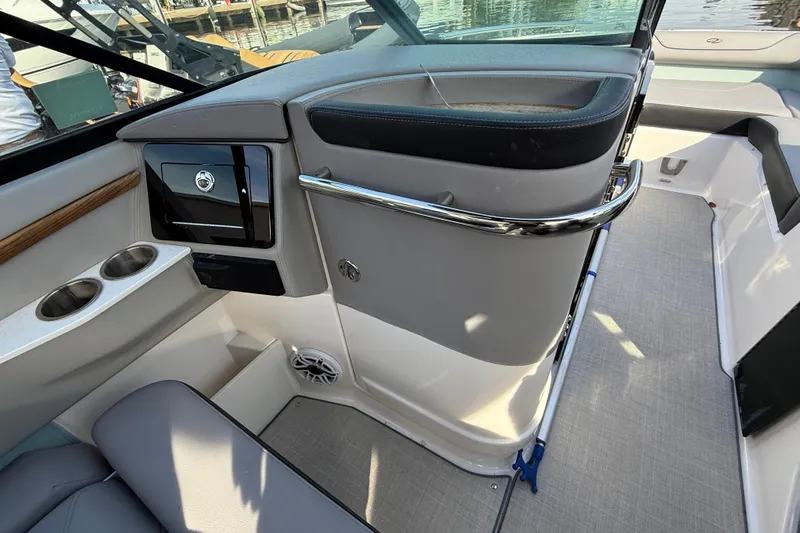  Yacht Photos Pics 2024 Regal LX9 boat interior with cup holders, storage, and sleek design.