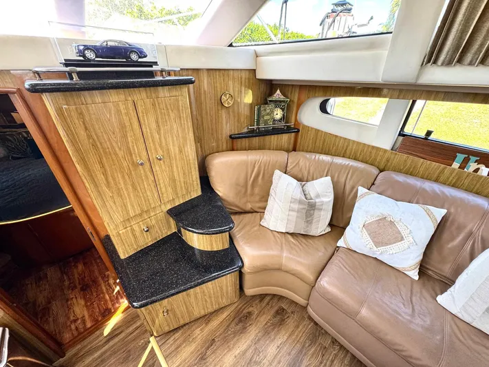 Craver Yacht Photos Pics Luxurious interior of 2001 Carver 396 Motor Yacht with leather seating and elegant decor.