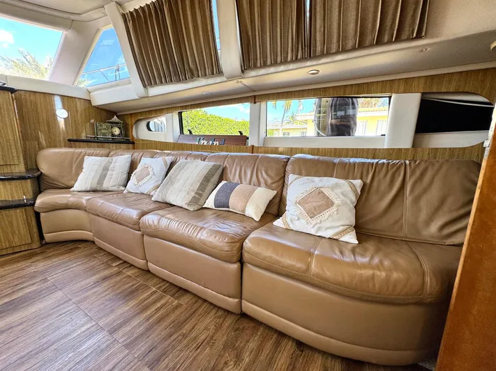 Craver Yacht Photos Pics Luxurious interior of 2001 Carver 396 Motor Yacht with leather seating and decorative pillows.