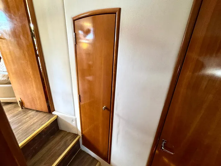 Craver Yacht Photos Pics Interior of 2001 Carver 396 Motor Yacht with wooden doors and steps.