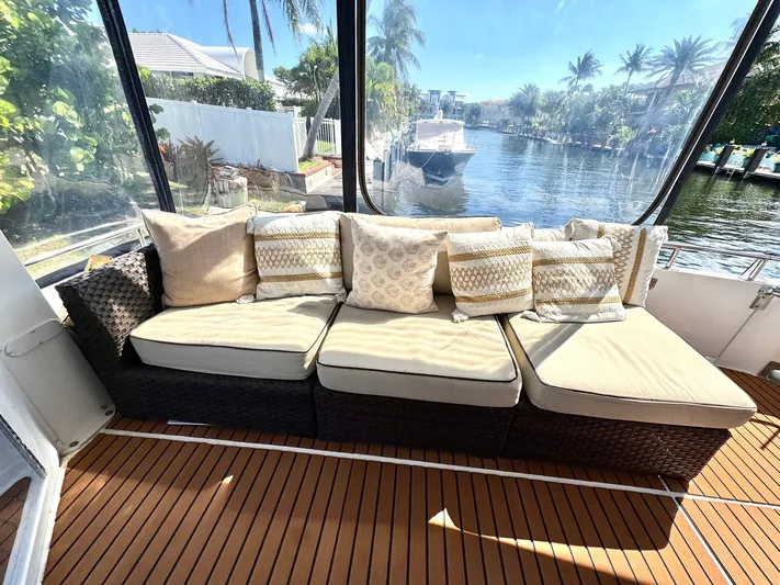 Craver Yacht Photos Pics Luxurious seating area on 2001 Carver 396 Motor Yacht with waterfront view.