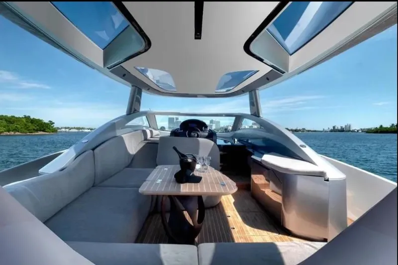 Lamborghini Tecnomar Yacht Photos Pics Luxurious Tecnomar 55 Evo yacht interior with panoramic windows, sleek design, and elegant seating, 2017 model.