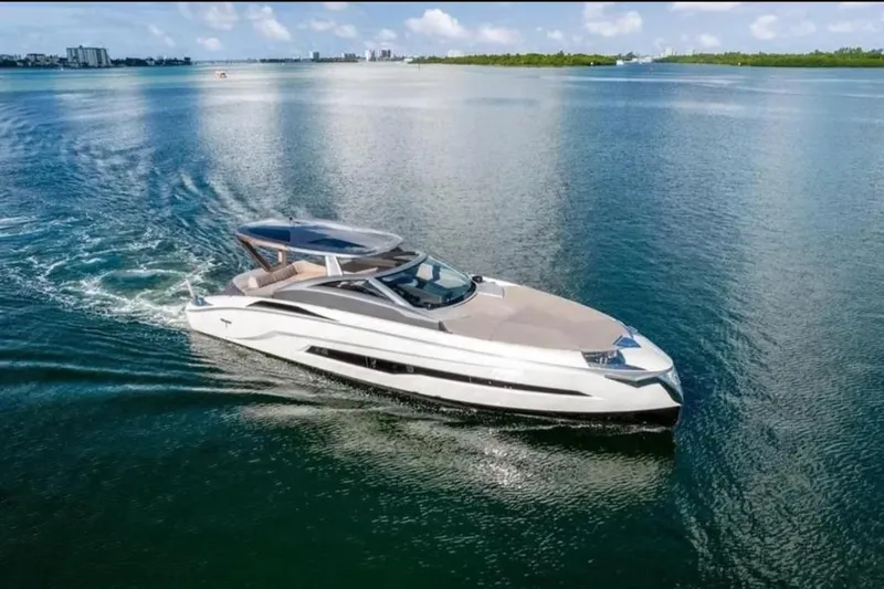 Lamborghini Tecnomar Yacht Photos Pics Luxurious 2017 Tecnomar 55 Evo yacht cruising on serene waters.