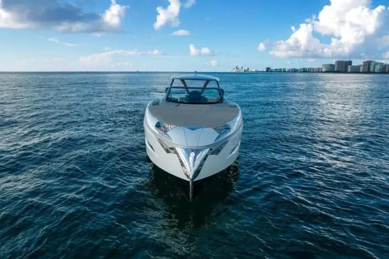 Lamborghini Tecnomar Yacht Photos Pics Tecnomar 55 Evo yacht on open sea, 2017 model, under clear blue sky.