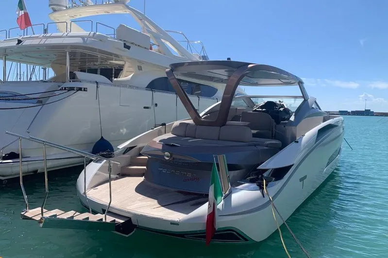Lamborghini Tecnomar Yacht Photos Pics Luxury Tecnomar 55 Evo yacht, 2017 model, docked in a sunny marina.