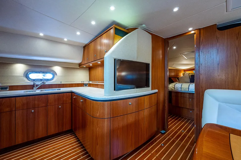 Second Chance II Yacht Photos Pics 2007 Tiara Yachts 4300 Sovran interior with wood cabinetry and modern amenities.