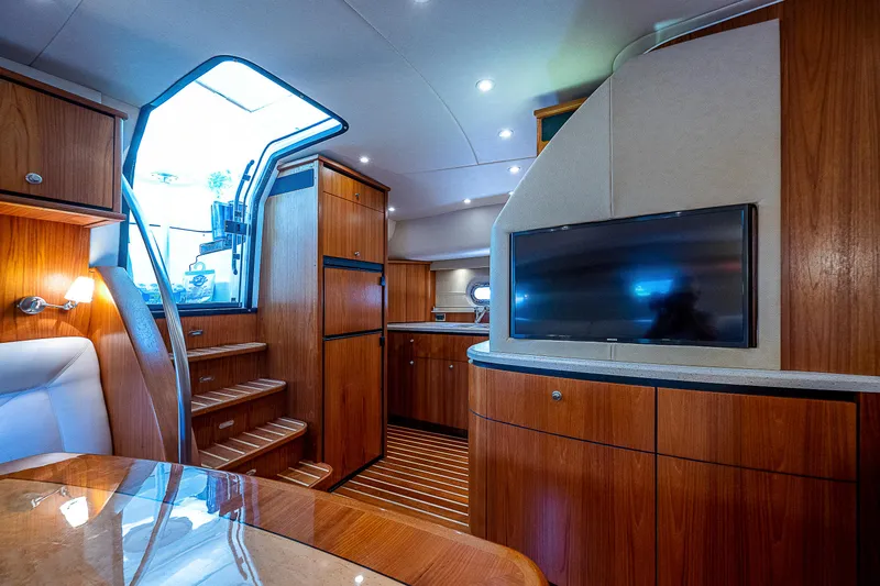 Second Chance II Yacht Photos Pics 2007 Tiara Yachts 4300 Sovran interior with wood finish and modern amenities.