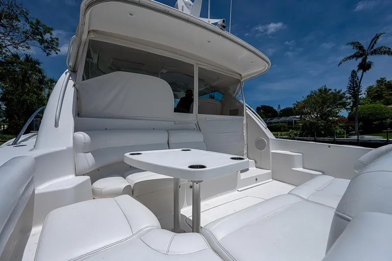 Second Chance II Yacht Photos Pics 2007 Tiara Yachts 4300 Sovran with white seating and table on deck.