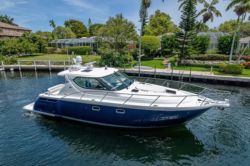 Second Chance II Yacht Photos Pics 2007 Tiara Yachts 4300 Sovran cruising on a scenic waterway.