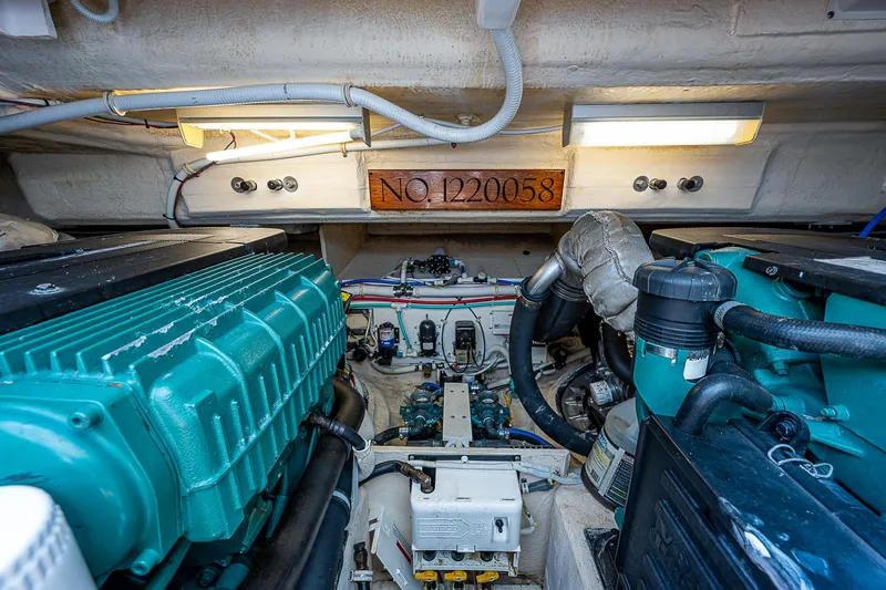 Second Chance II Yacht Photos Pics Engine room of 2007 Tiara Yachts 4300 Sovran, showcasing mechanical components.